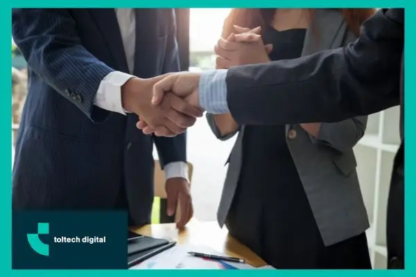 A Digital Marketing Contract Being Signed At Toltech Digital